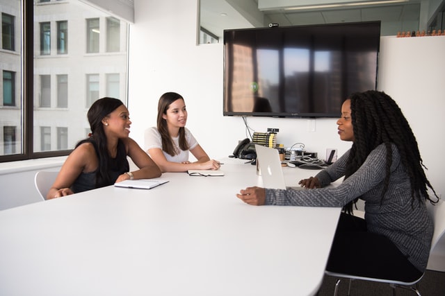 HR manager discussing with employees