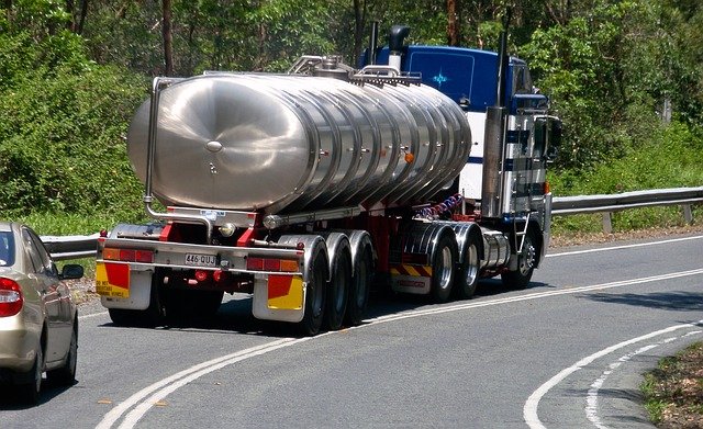 Heavy truck carrying oil tanker
